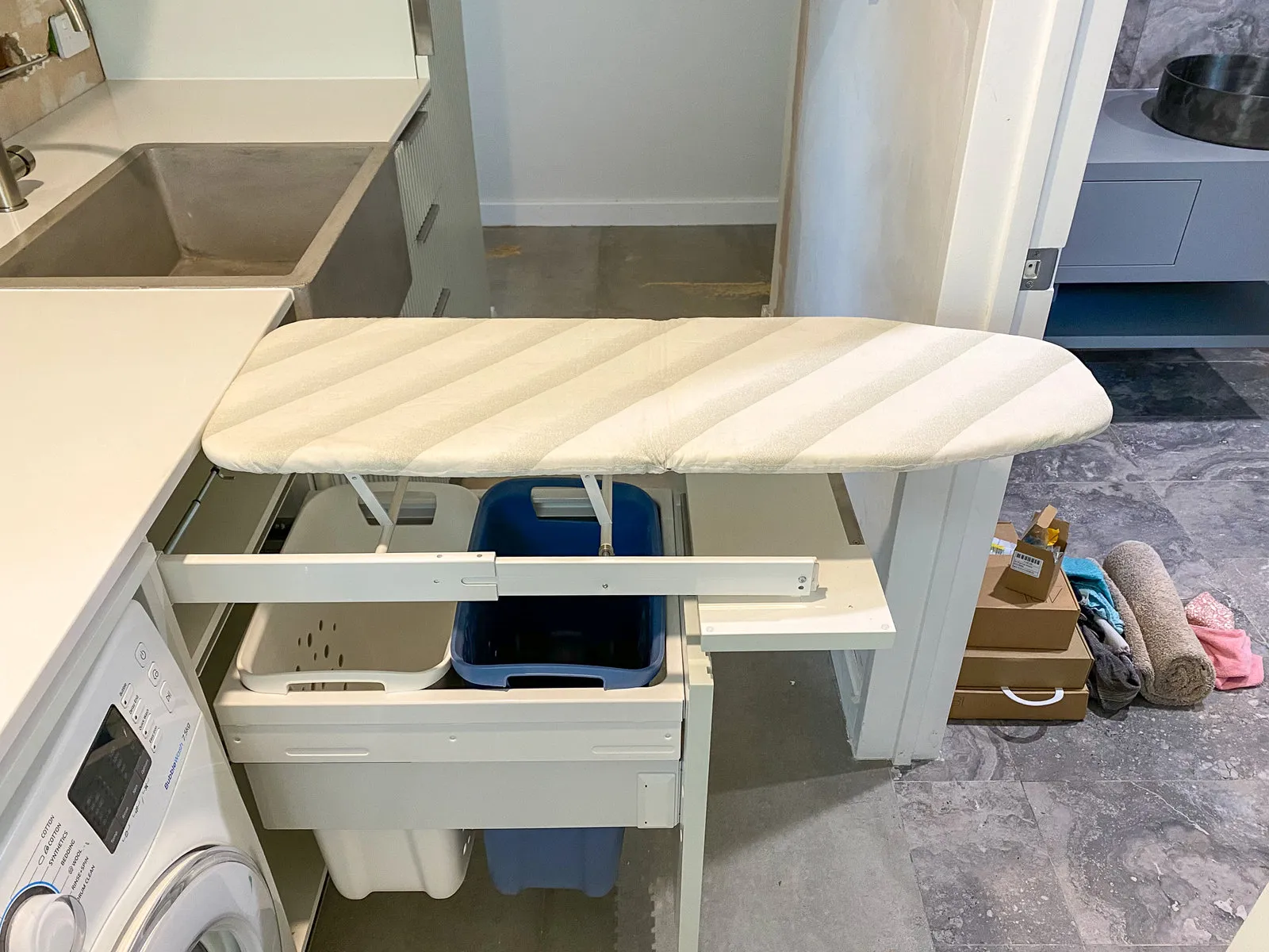 Pull-out ironing station