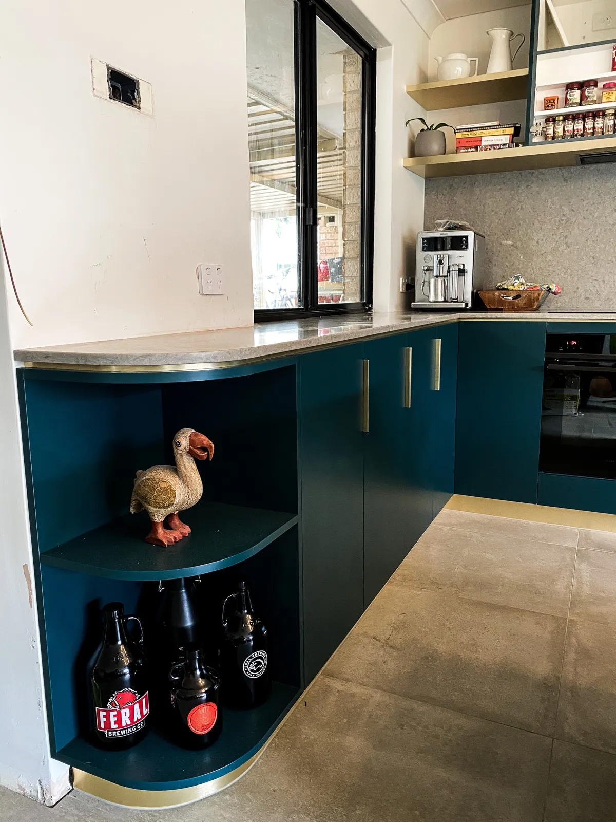 Teal kitchen, brass open shelving