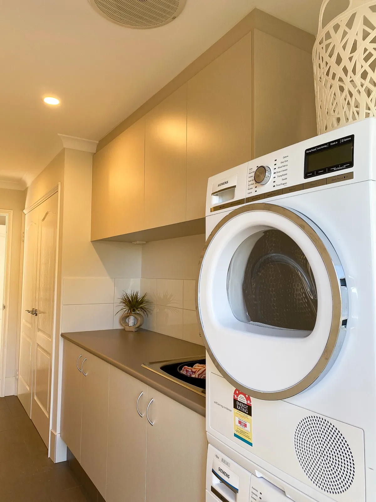 Laundry with stacked appliances