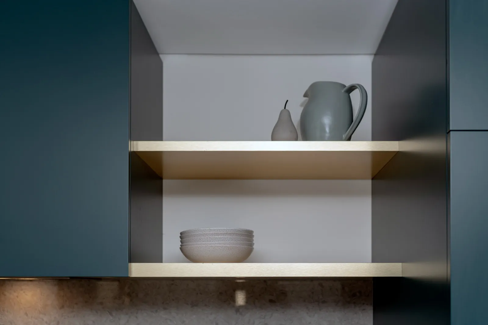 Brass shelf styling detail