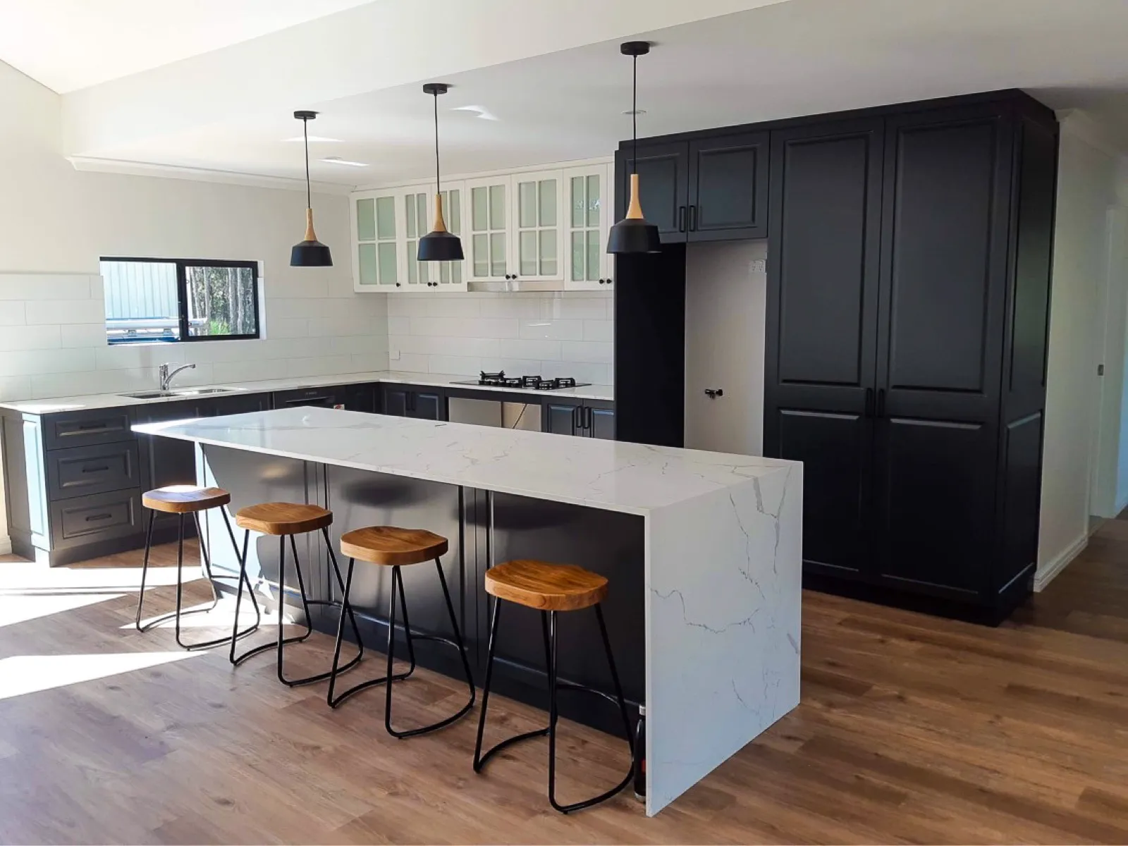 Black shaker kitchen, marble island