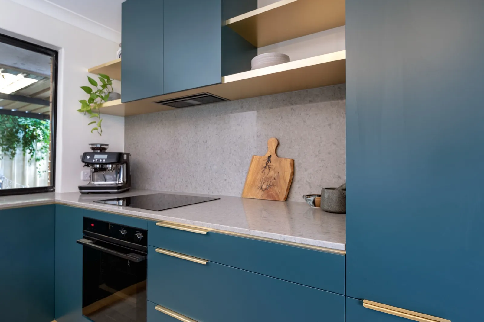 Teal kitchen, brass rail pulls