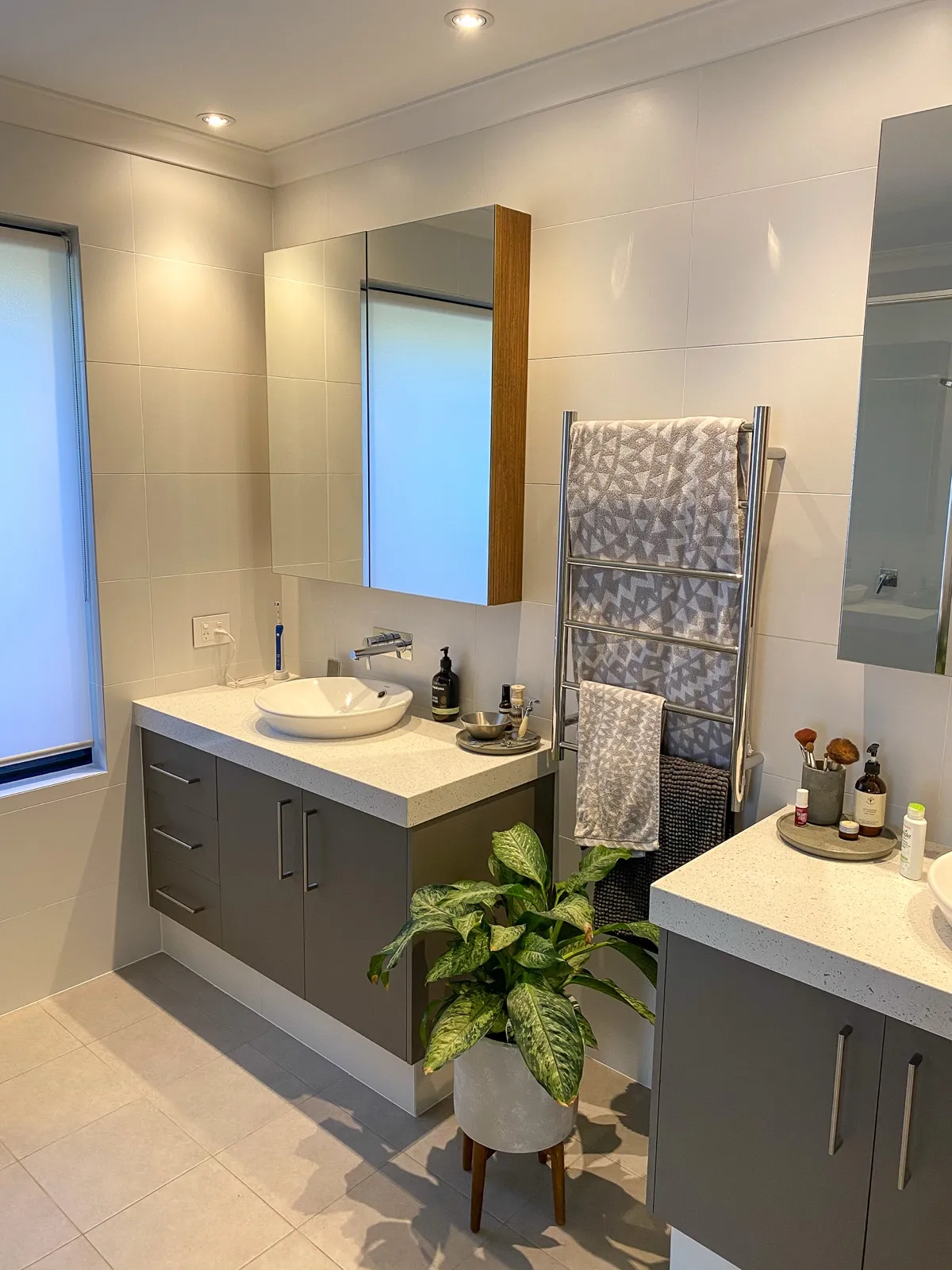 Twin vanities, floating drawers
