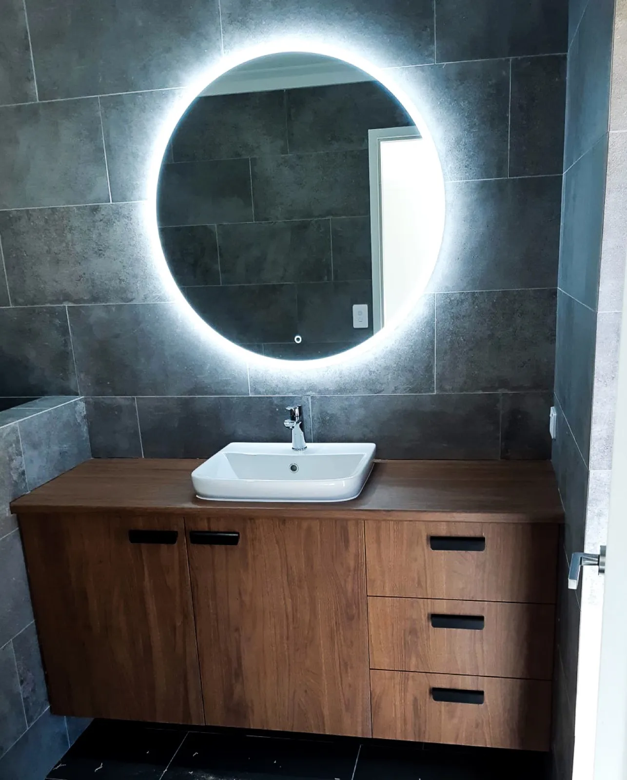 Walnut vanity, round backlit mirror